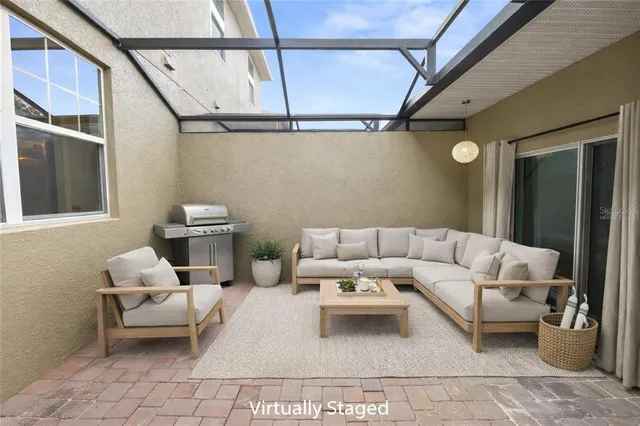 a living room with furniture and a rug