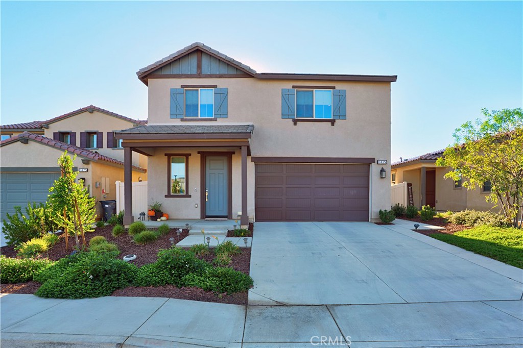 11479 Sheridan Way Beaumont, CA 92223 - Photo 2 of 40 front view of a house with a yard