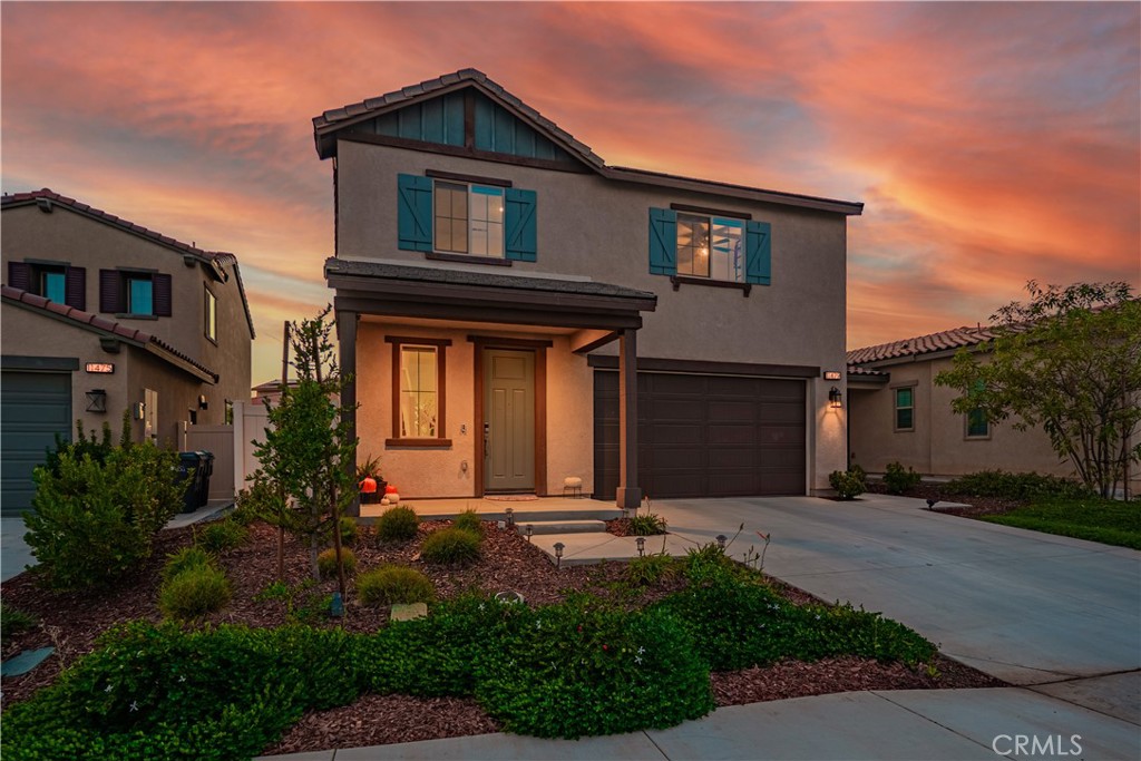 11479 Sheridan Way Beaumont, CA 92223 - Photo 40 of 40 a front view of a house with a yard