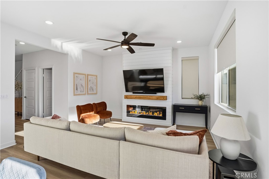 11479 Sheridan Way Beaumont, CA 92223 - Photo 6 of 40 a living room with furniture and a flat screen tv
