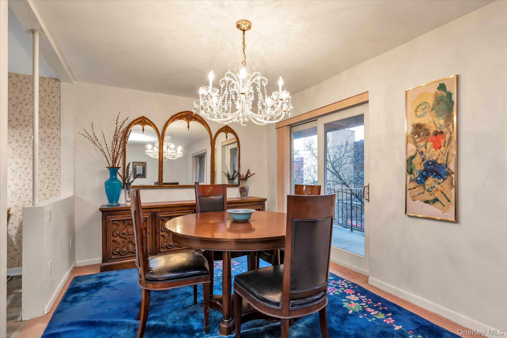 30 Barstow Road, Unit 3A Great Neck, NY 11021 - Photo 6 of 17 a view of a dining room with furniture window and wooden floor