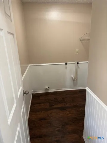 a view of entryway with wooden floor