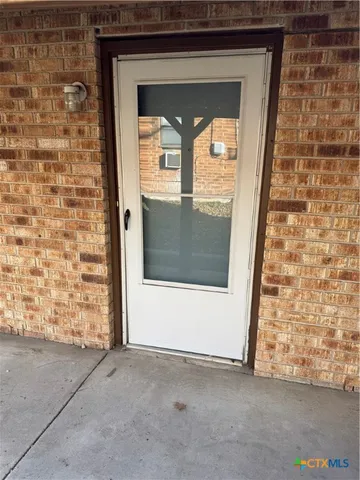 a view of entryway with a hallway