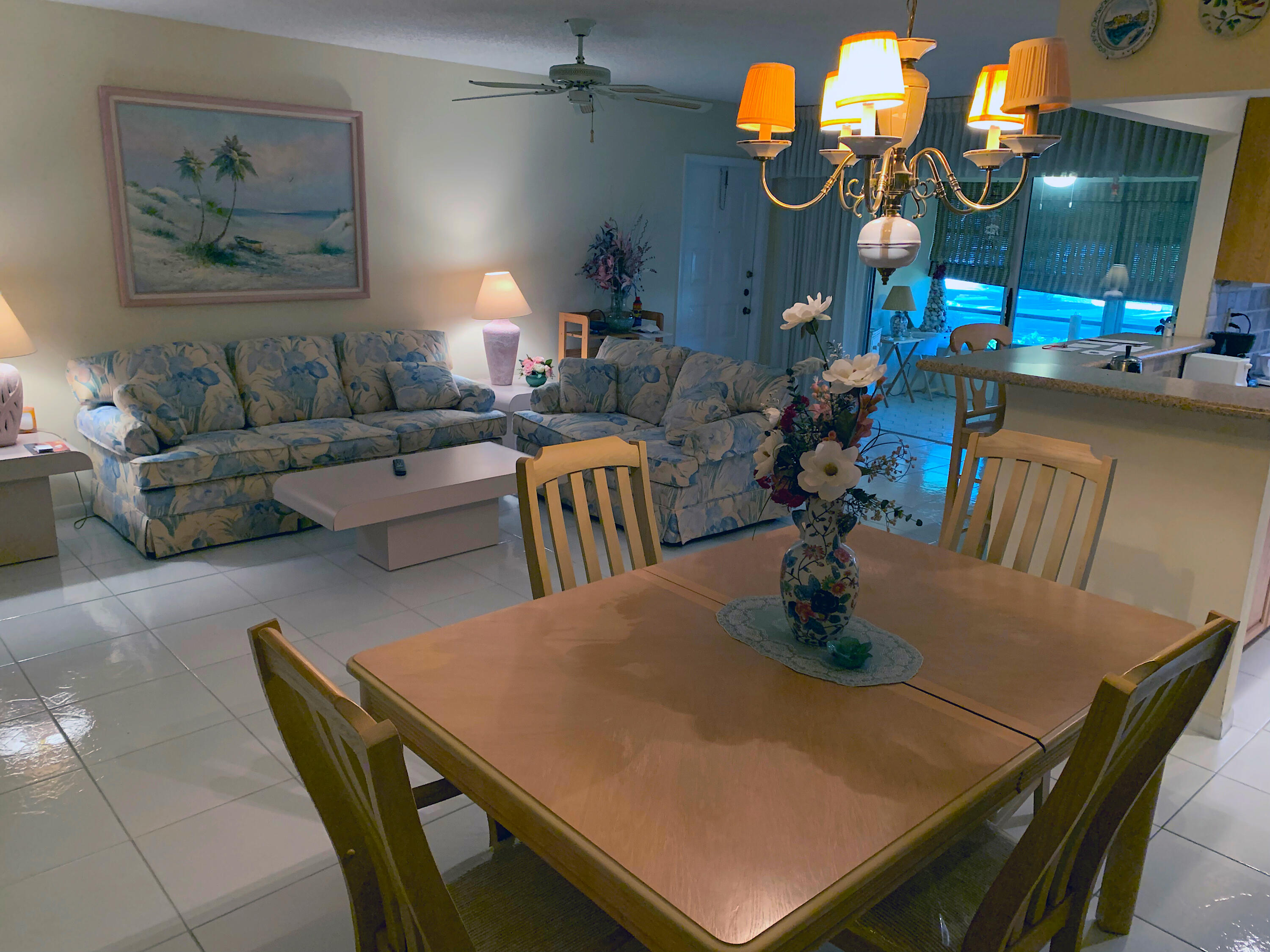 4540 Northwest 3rd Court, Unit C Delray Beach, FL 33445 - Photo 11 of 29 a dining room with furniture and wooden floor