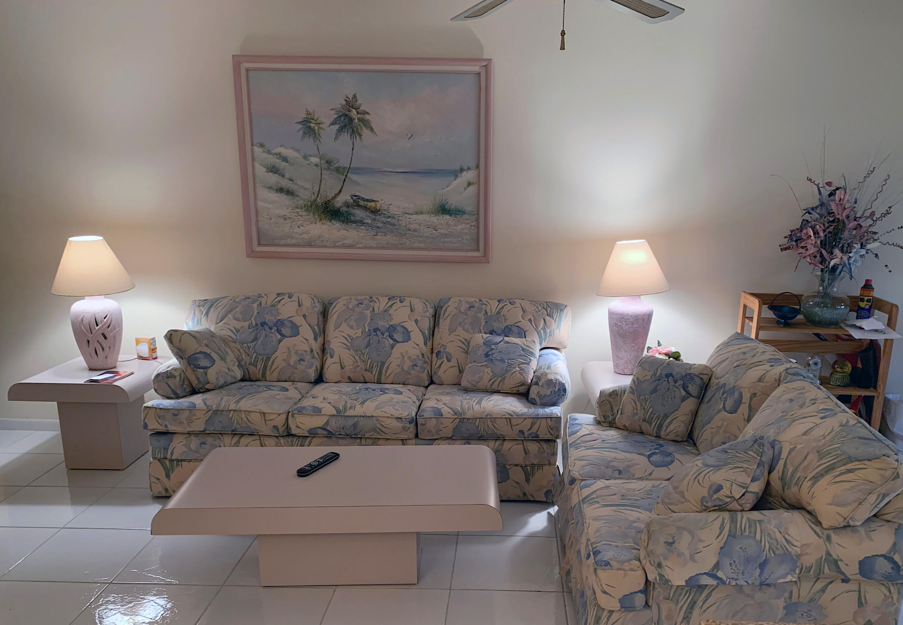 4540 Northwest 3rd Court, Unit C Delray Beach, FL 33445 - Photo 15 of 29 a living room with furniture and a lamp