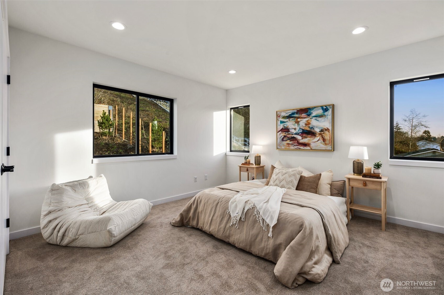 5244 23rd Avenue Southwest Seattle, WA 98106 - Photo 21 of 35 a bedroom with two beds and painting on the wall