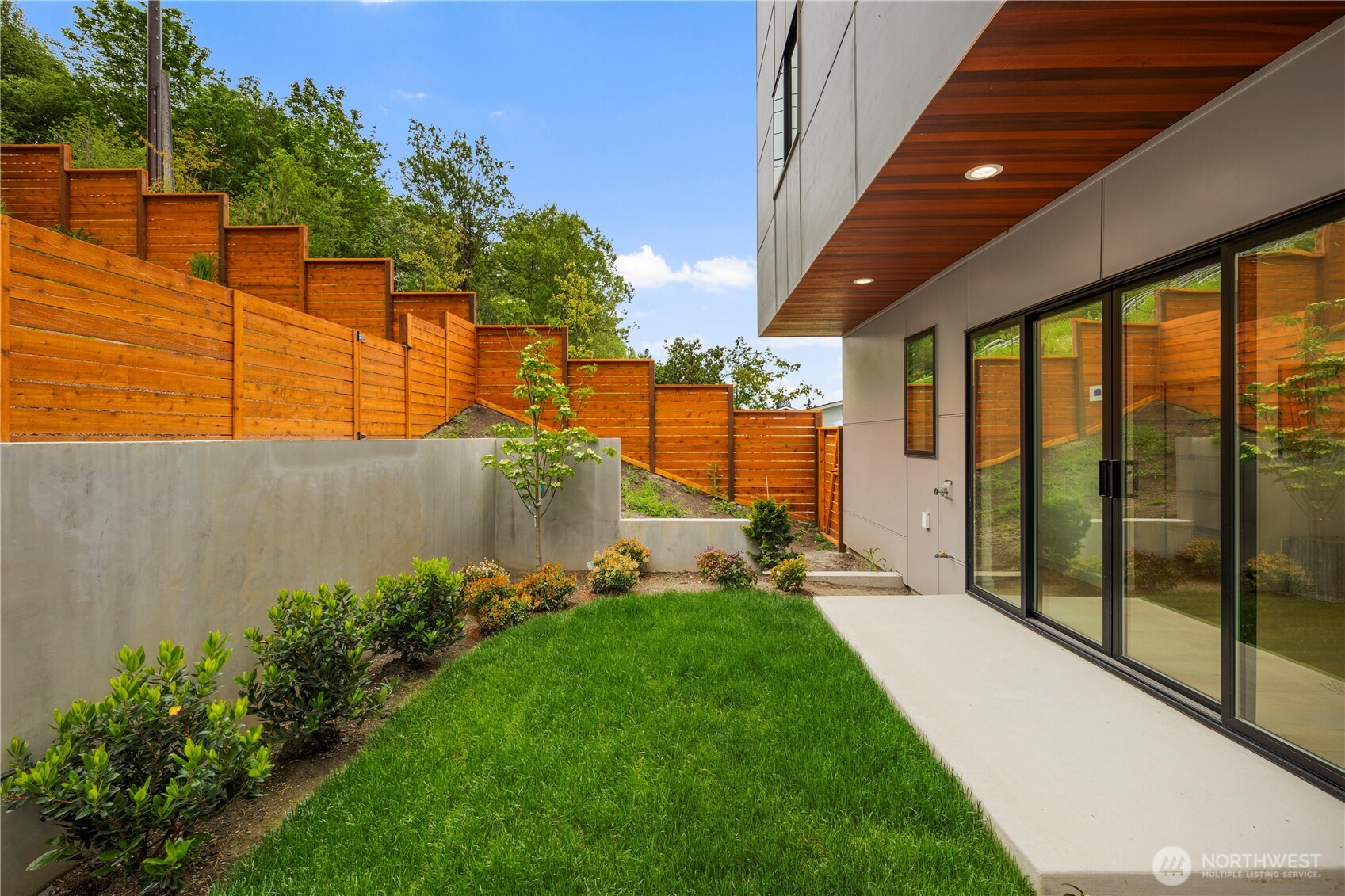5244 23rd Avenue Southwest Seattle, WA 98106 - Photo 34 of 35 a view of a backyard with garden