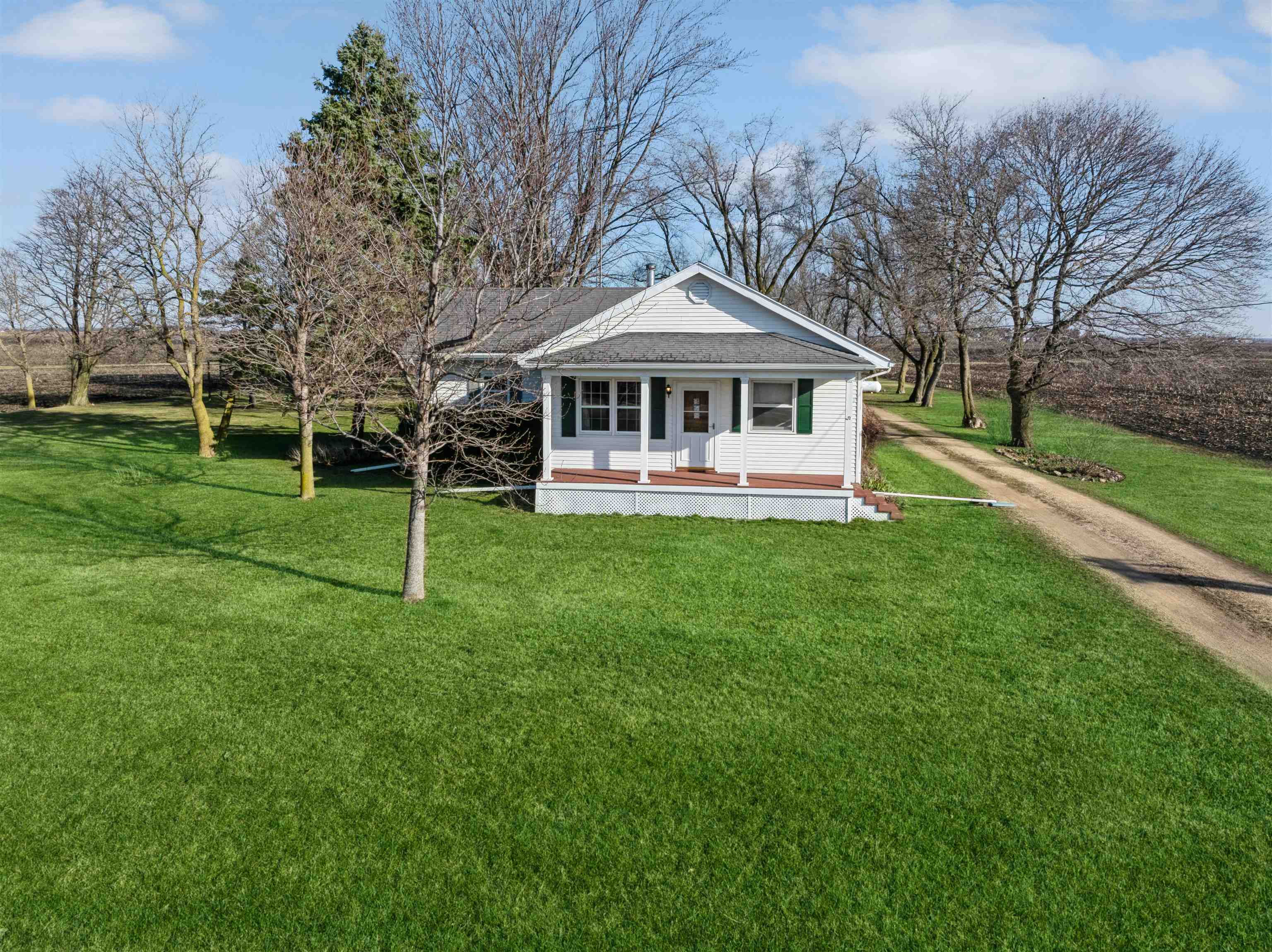 10926 Hill Road Garden Prairie, IL 61038 - Photo 1 of 53 a front view of a house with a yard