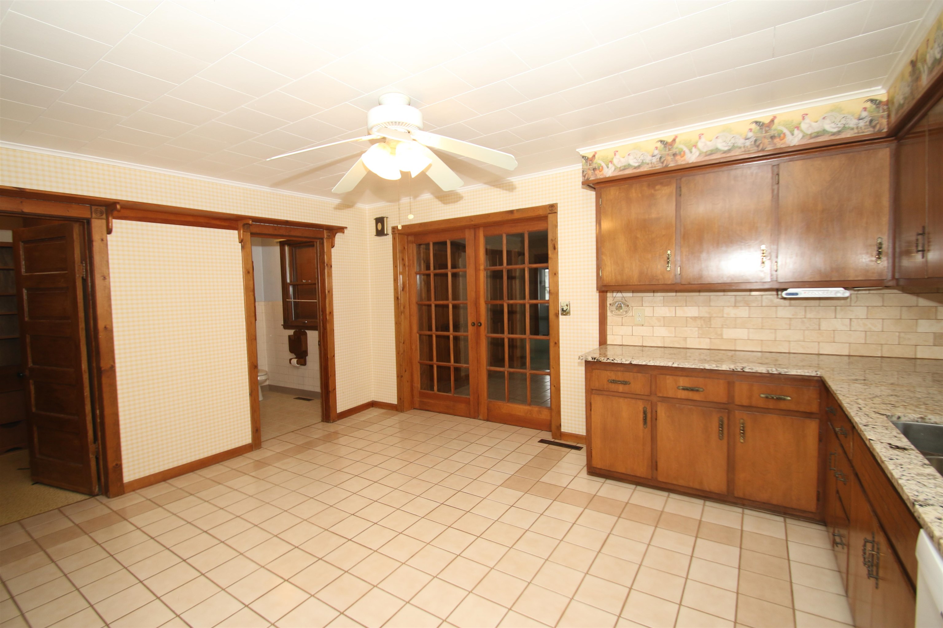 10926 Hill Road Garden Prairie, IL 61038 - Photo 12 of 53 a kitchen with granite countertop a sink and cabinets