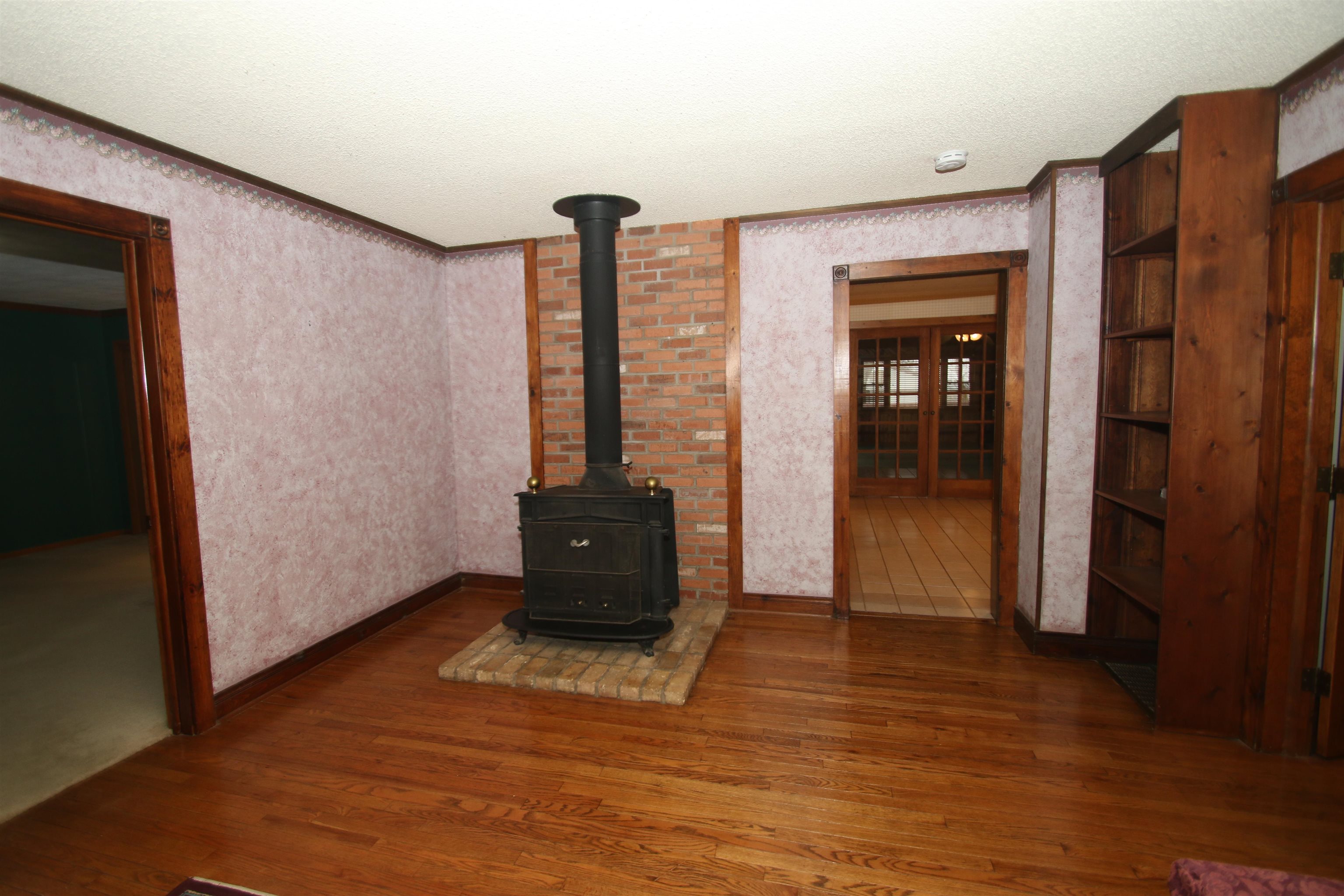 10926 Hill Road Garden Prairie, IL 61038 - Photo 16 of 53 a view of a room with wooden floor