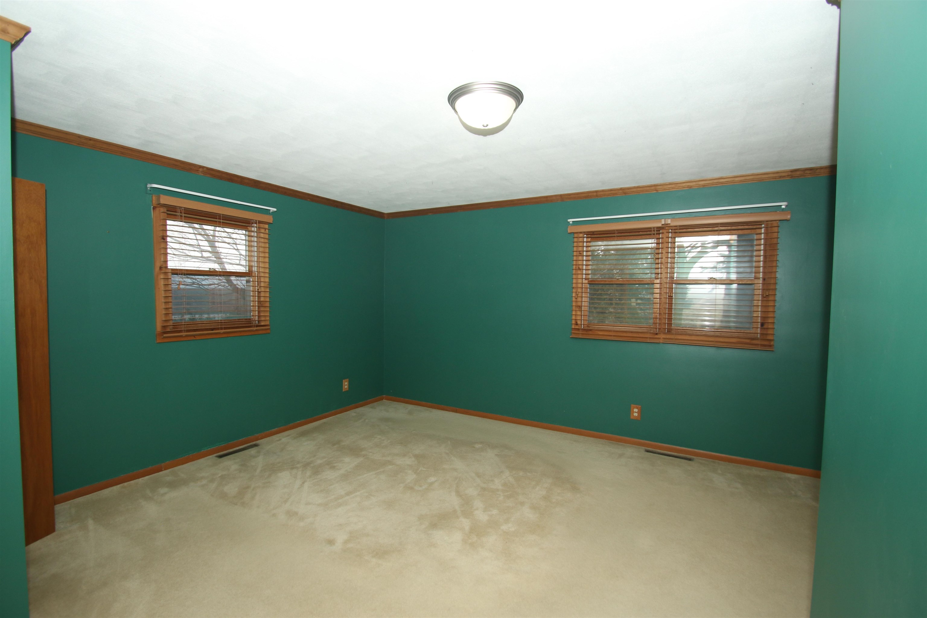 10926 Hill Road Garden Prairie, IL 61038 - Photo 18 of 53 a view of a room that has a fan and window in it