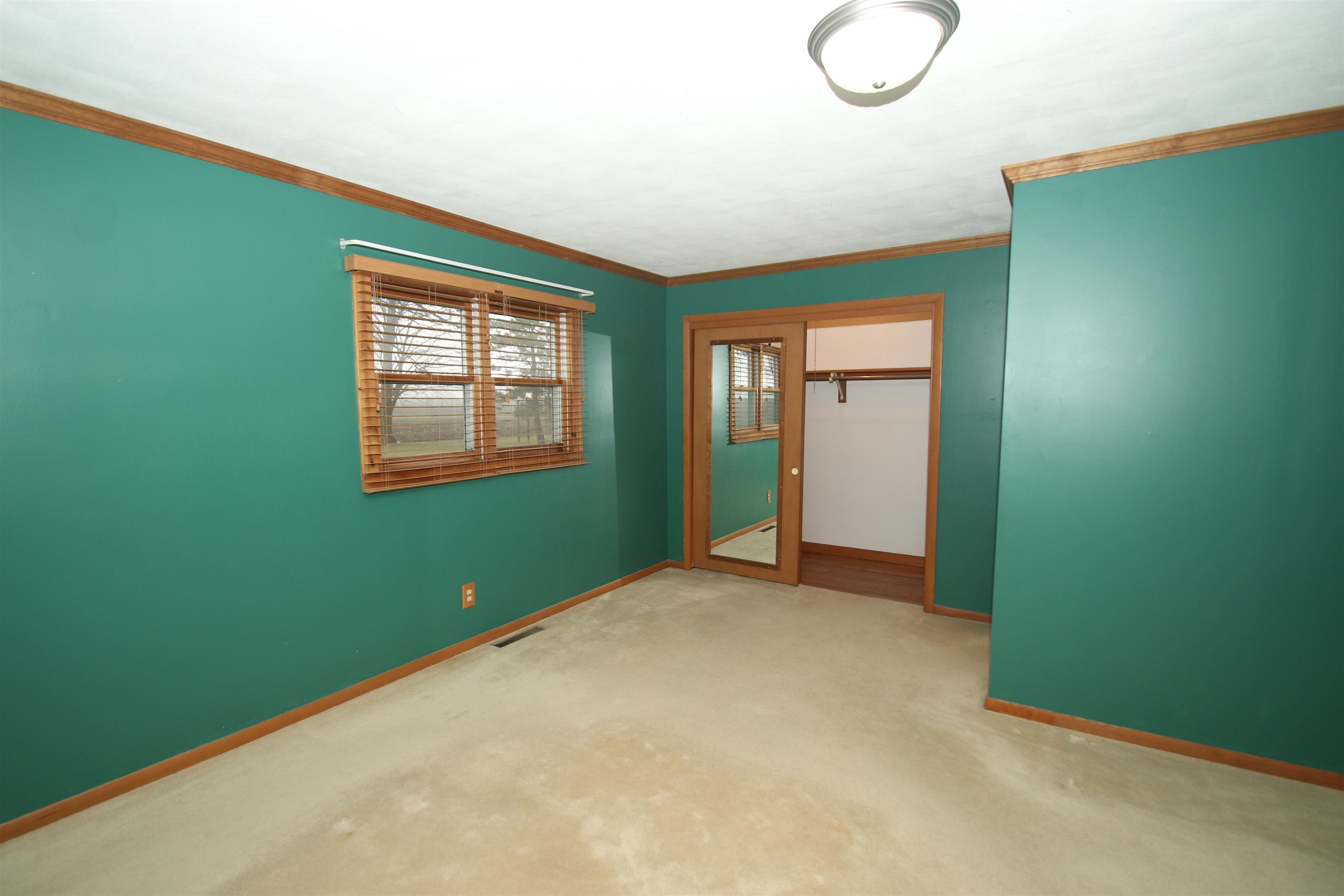 10926 Hill Road Garden Prairie, IL 61038 - Photo 20 of 53 a view of an empty room with closet and a window