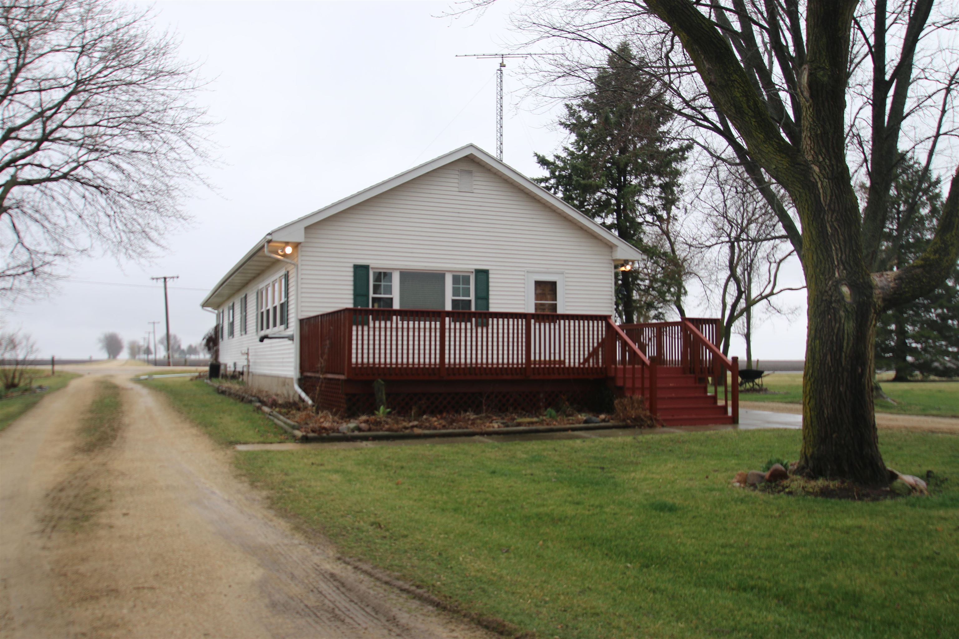 10926 Hill Road Garden Prairie, IL 61038 - Photo 32 of 53 a view of a house with a yard and a large tree