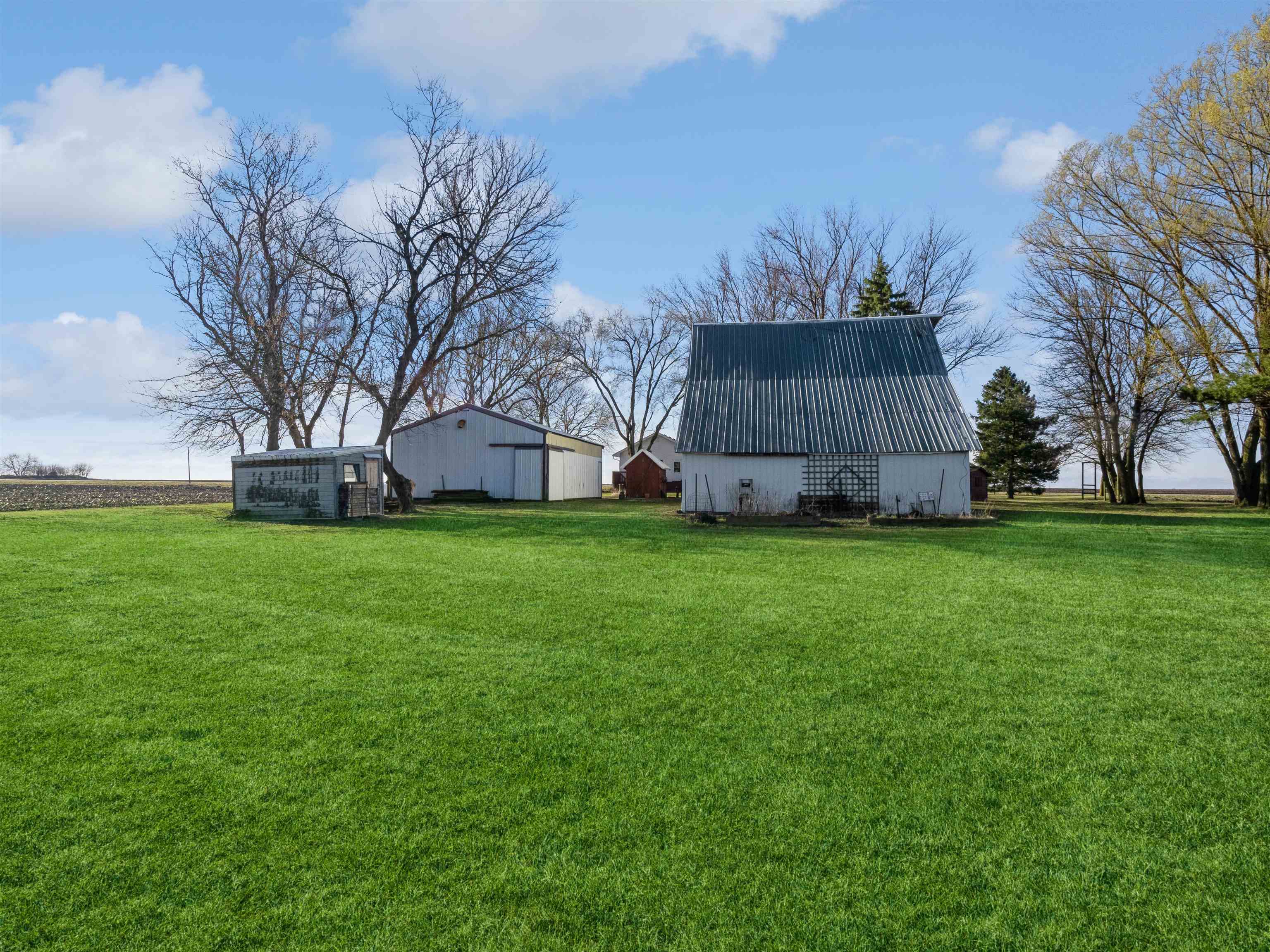 10926 Hill Road Garden Prairie, IL 61038 - Photo 38 of 53 a view of a house with a back yard