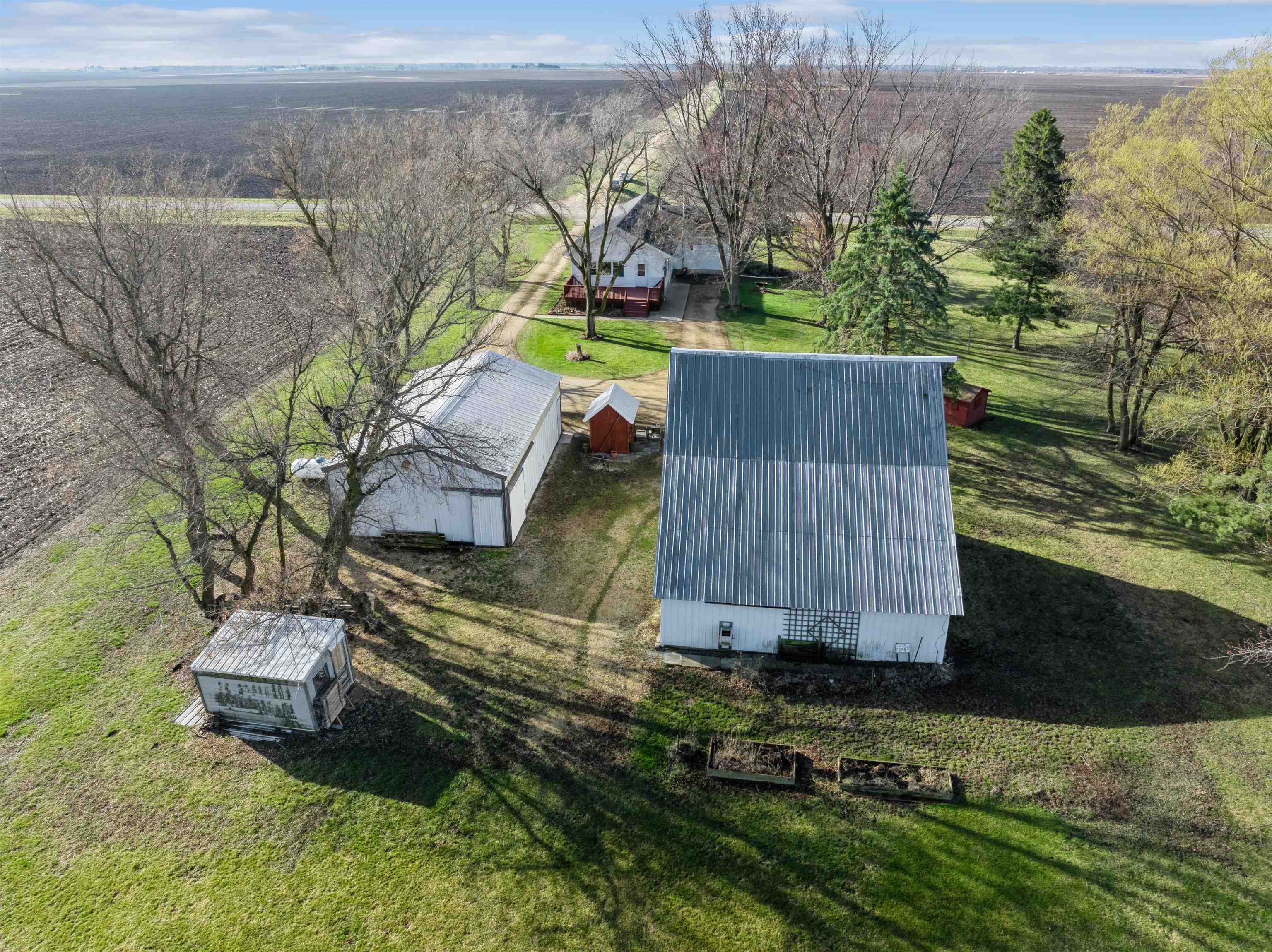 10926 Hill Road Garden Prairie, IL 61038 - Photo 46 of 53 an aerial view of a house with a garden