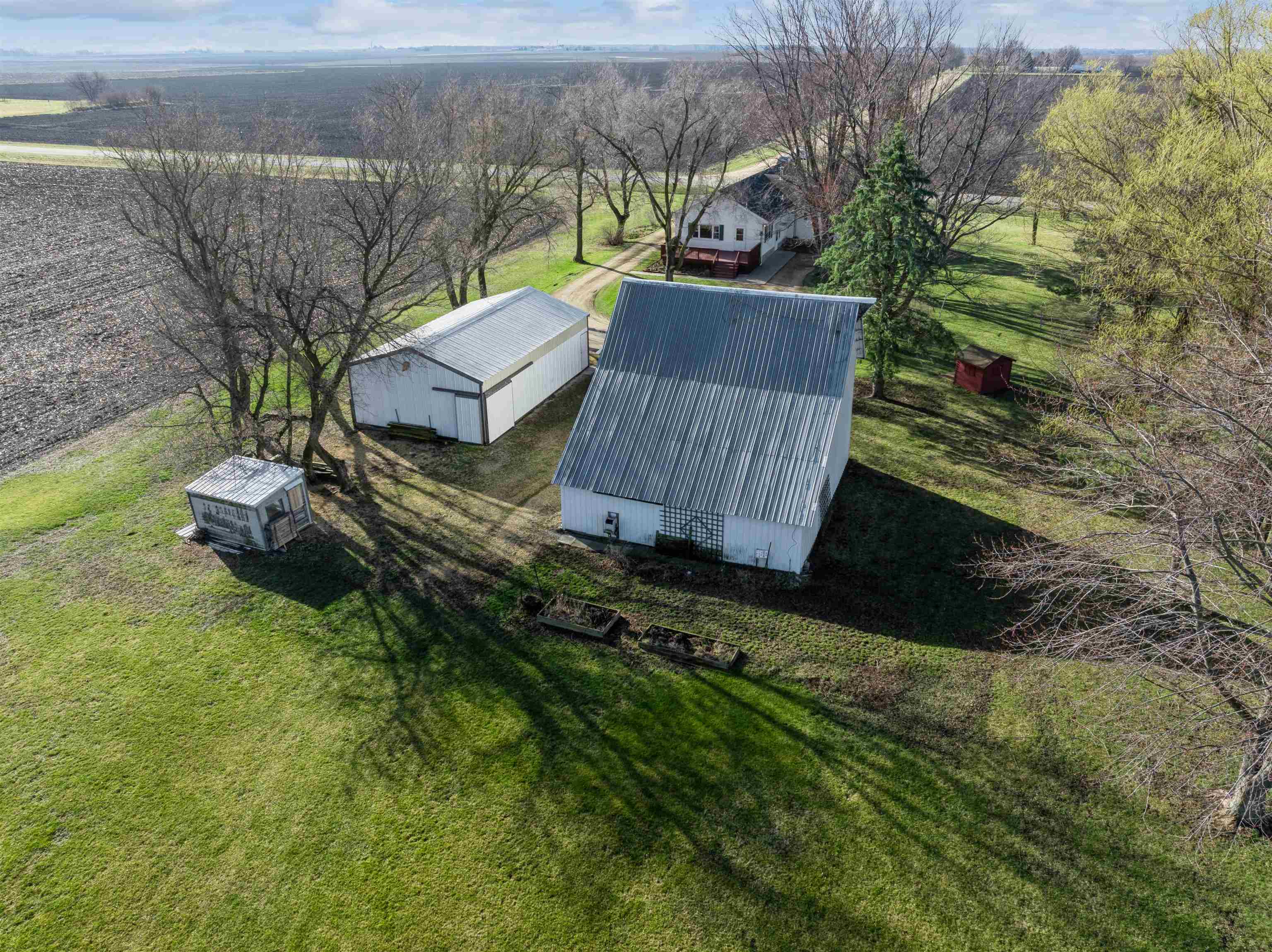 10926 Hill Road Garden Prairie, IL 61038 - Photo 47 of 53 a view of a house with a yard