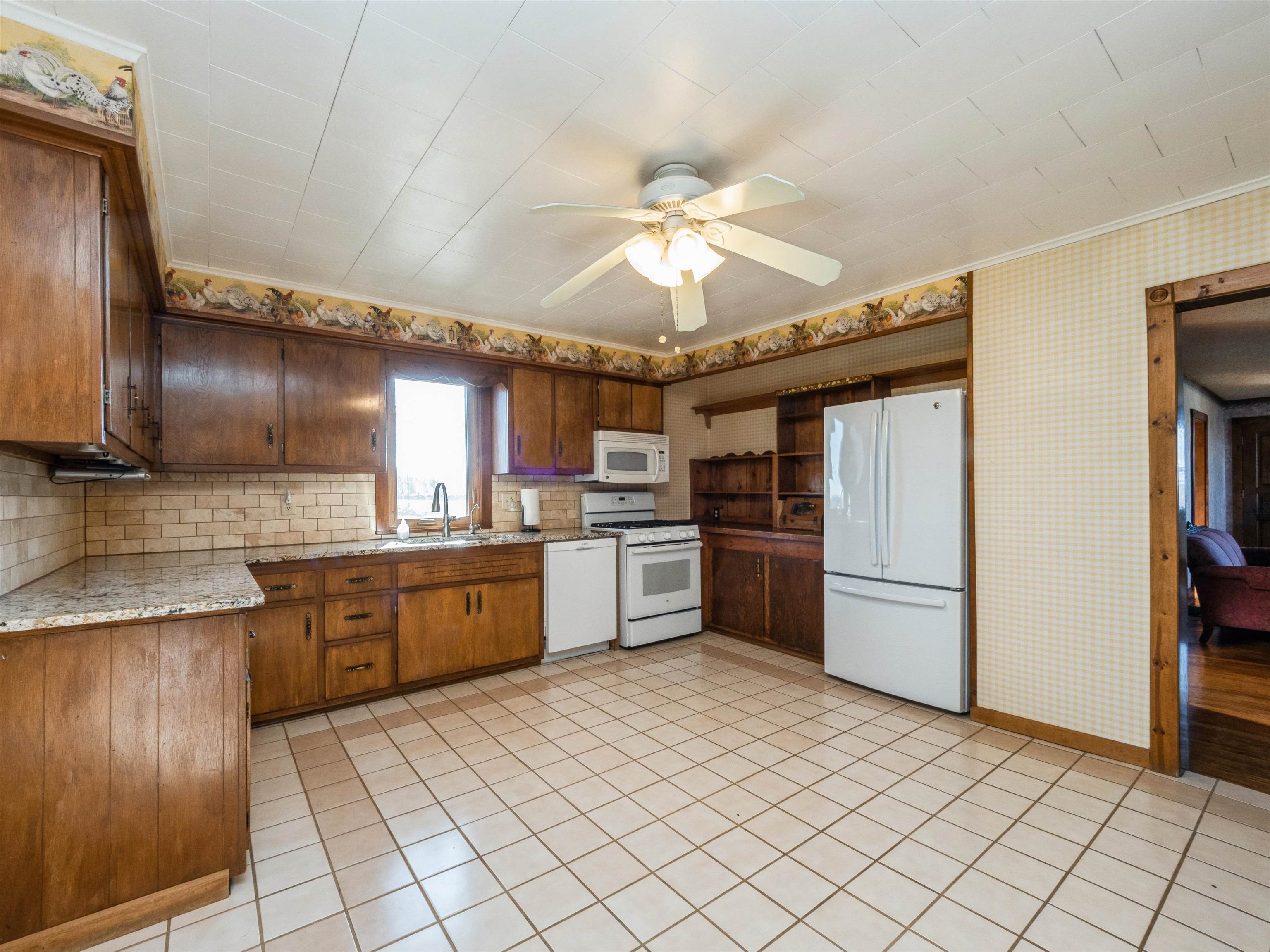 10926 Hill Road Garden Prairie, IL 61038 - Photo 8 of 53 a kitchen with stainless steel appliances granite countertop a sink counter space cabinets and stainless steel appliances