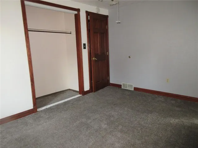 an empty room with closet