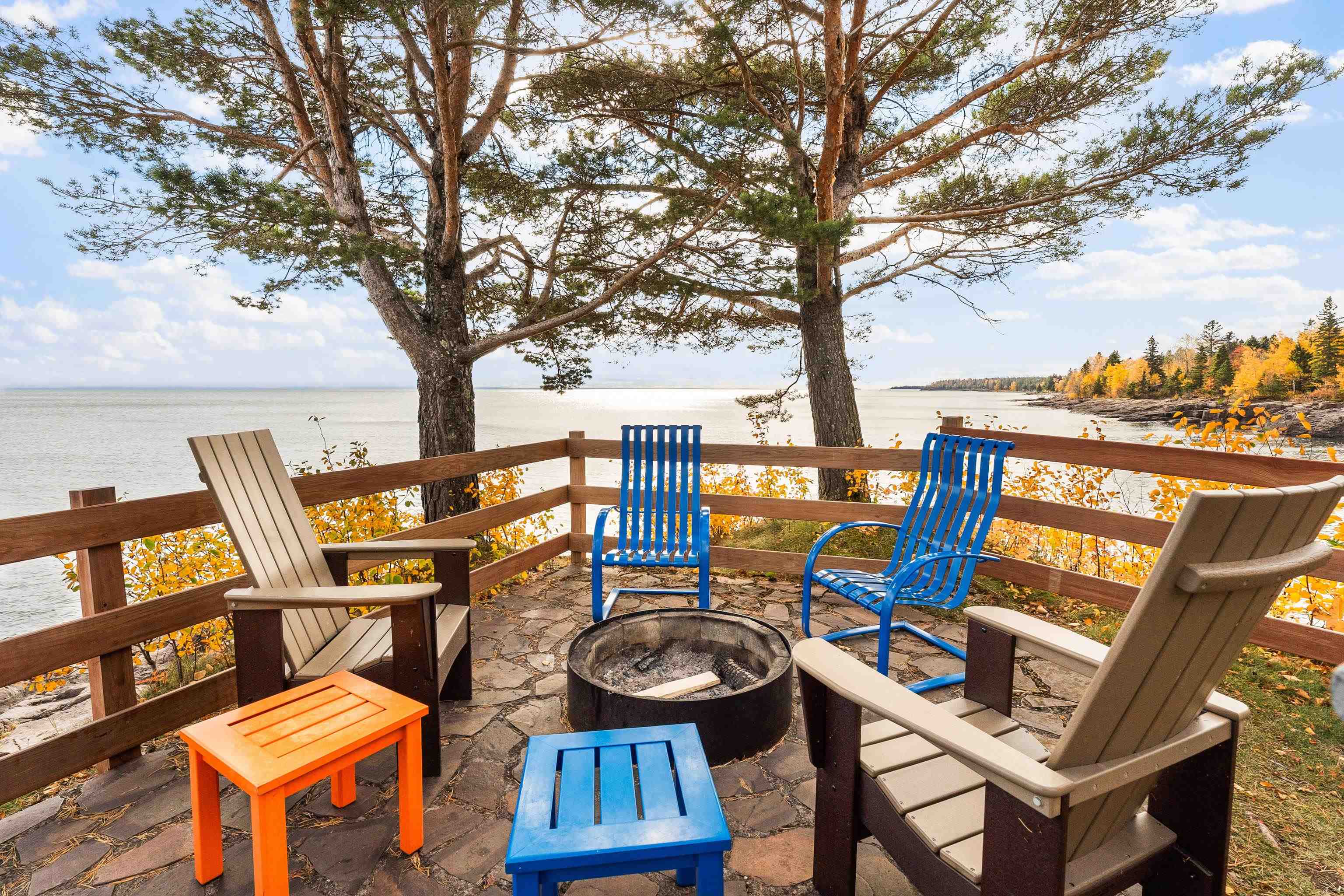 540 Old North Shore Road, Unit 7 Two Harbors, MN 55616 - Photo 32 of 61 Wooden terrace featuring an outdoor fire pit and a water view
