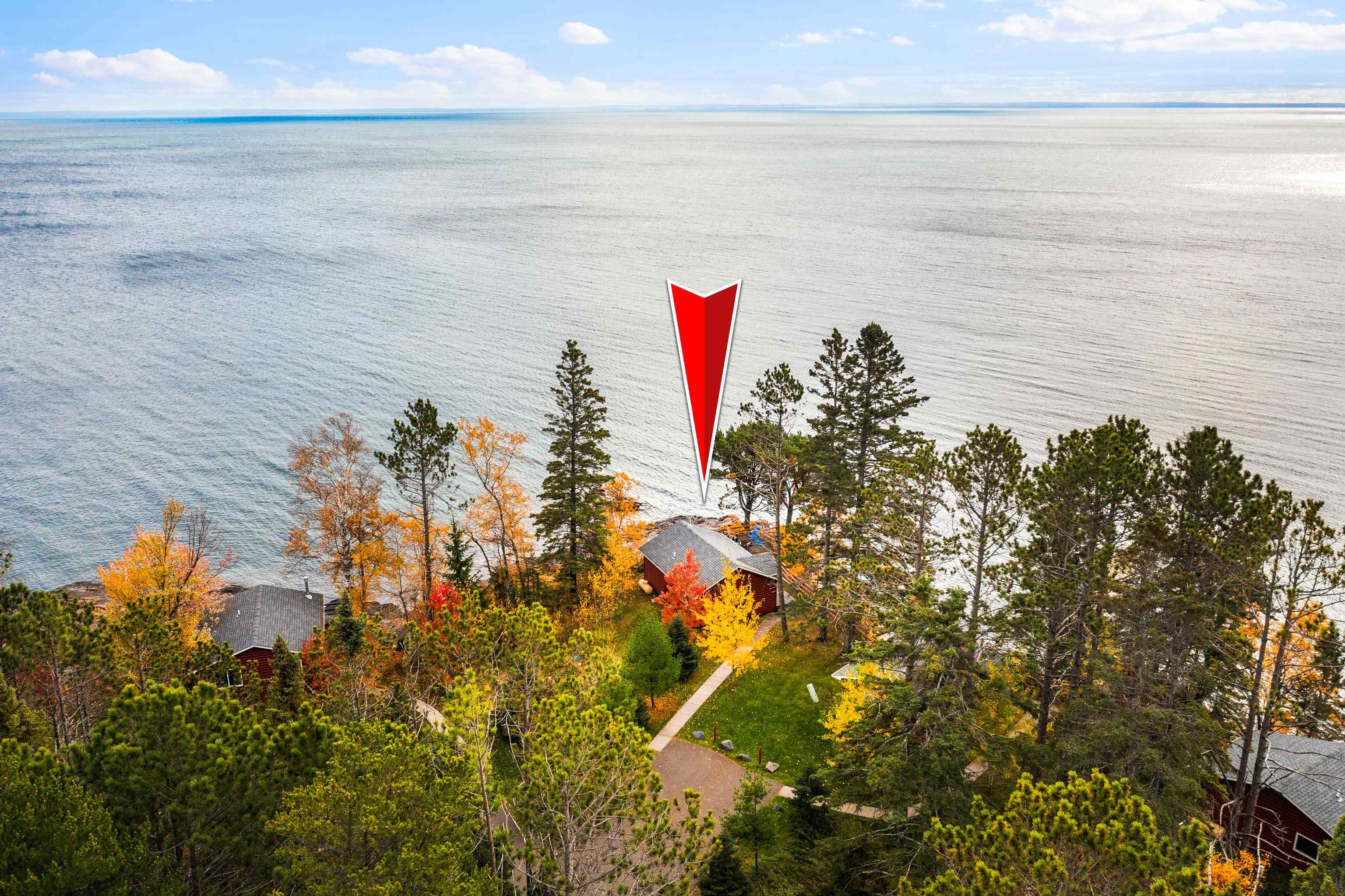 540 Old North Shore Road, Unit 7 Two Harbors, MN 55616 - Photo 46 of 61 Aerial view of property and surrounding area featuring a nearby body of water