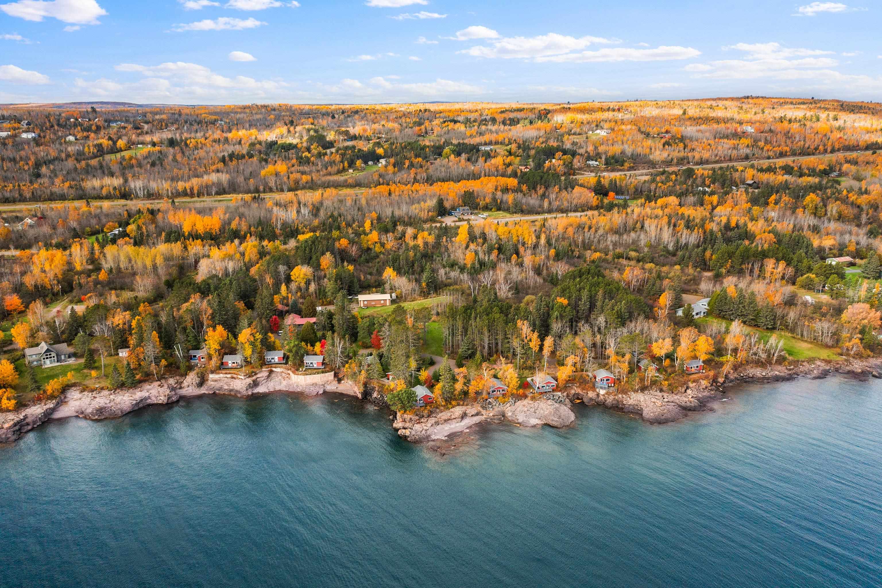 540 Old North Shore Road, Unit 7 Two Harbors, MN 55616 - Photo 60 of 61 Bird's eye view of a nearby body of water and a forest