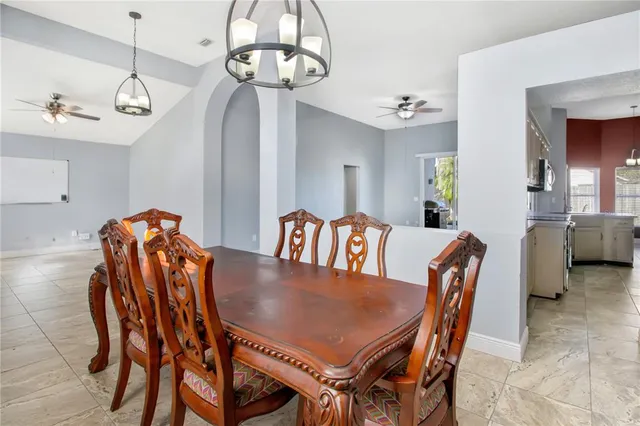 a view of a dining room with furniture