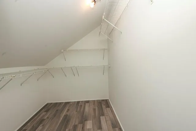 a view of a room with racks on the wall