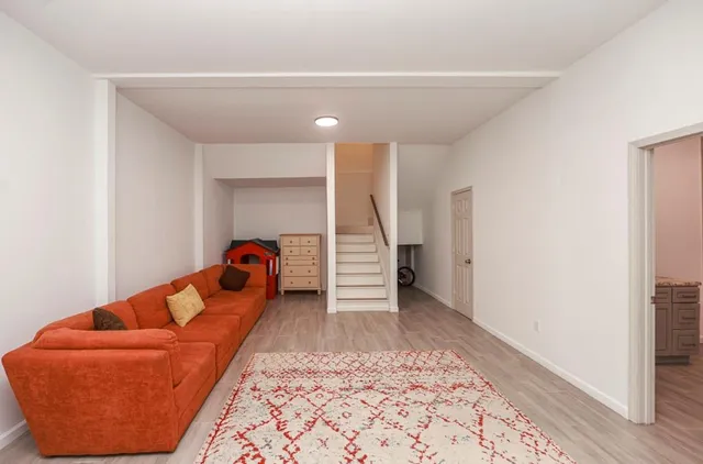 a bed room with a bed and a couch