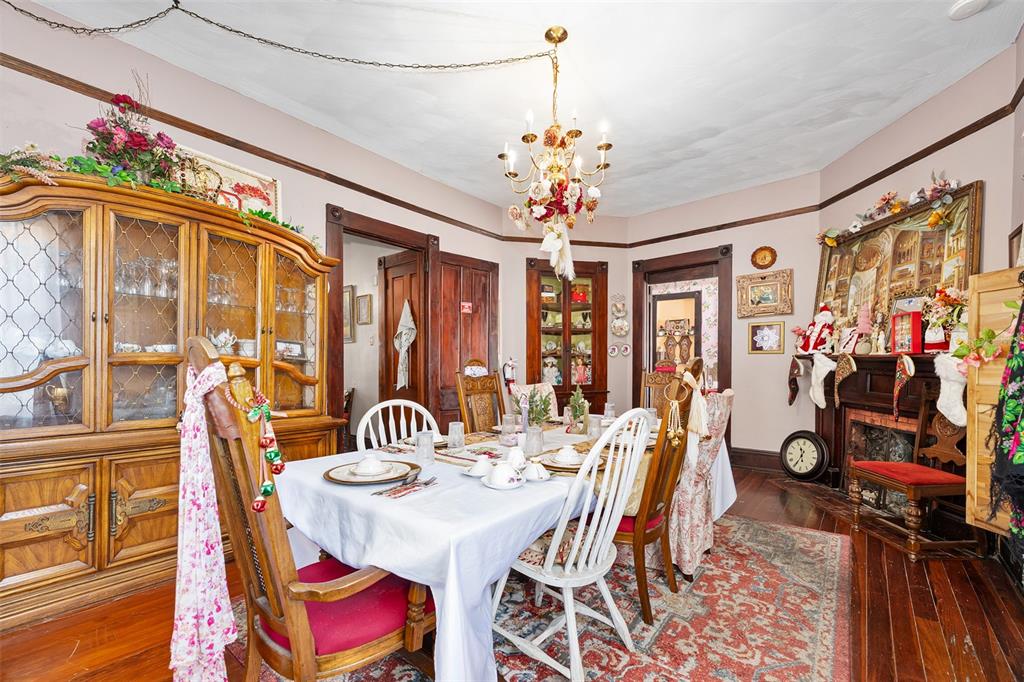 228 West Howry Avenue DeLand, FL 32720 - Photo 13 of 55 a view of a dining room with furniture window and outside view