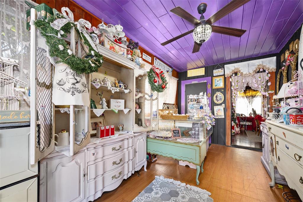 228 West Howry Avenue DeLand, FL 32720 - Photo 18 of 55 a kitchen with stainless steel appliances granite countertop a stove and cabinets