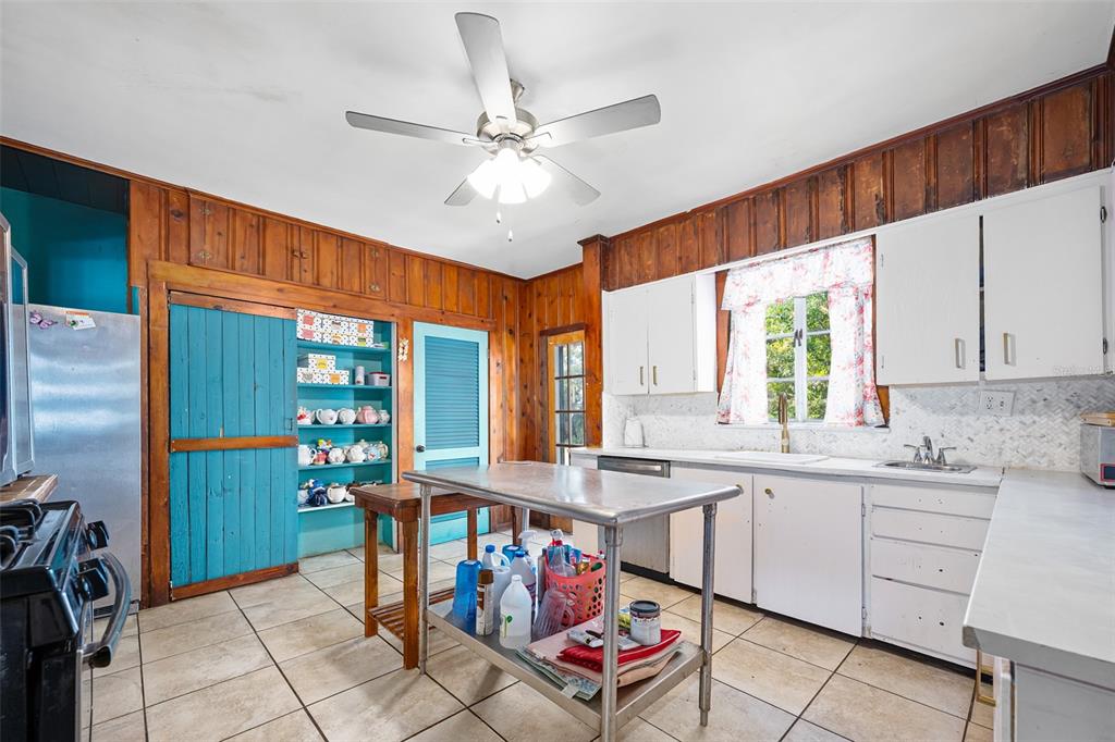 228 West Howry Avenue DeLand, FL 32720 - Photo 33 of 55 a very nice looking dining room with a window and kitchen view