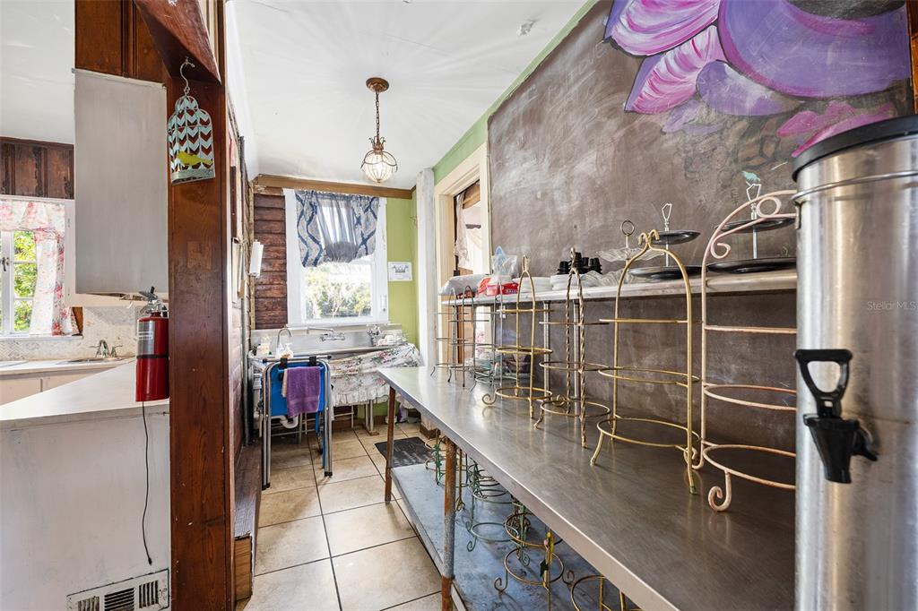 228 West Howry Avenue DeLand, FL 32720 - Photo 38 of 55 a very nice looking room with a large window