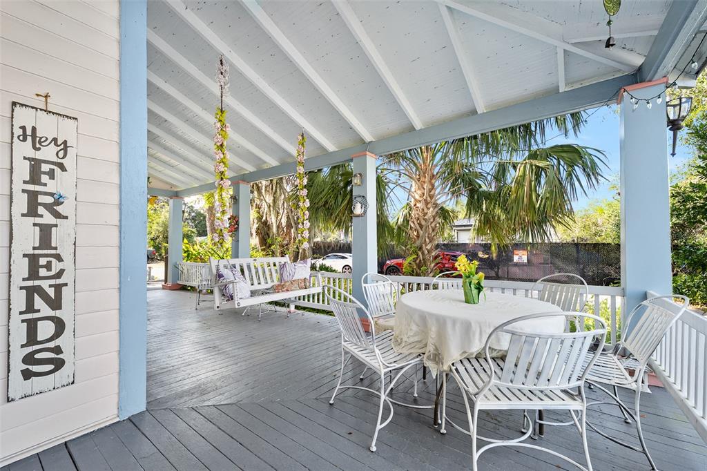 228 West Howry Avenue DeLand, FL 32720 - Photo 41 of 55 a dining room with furniture and garden view