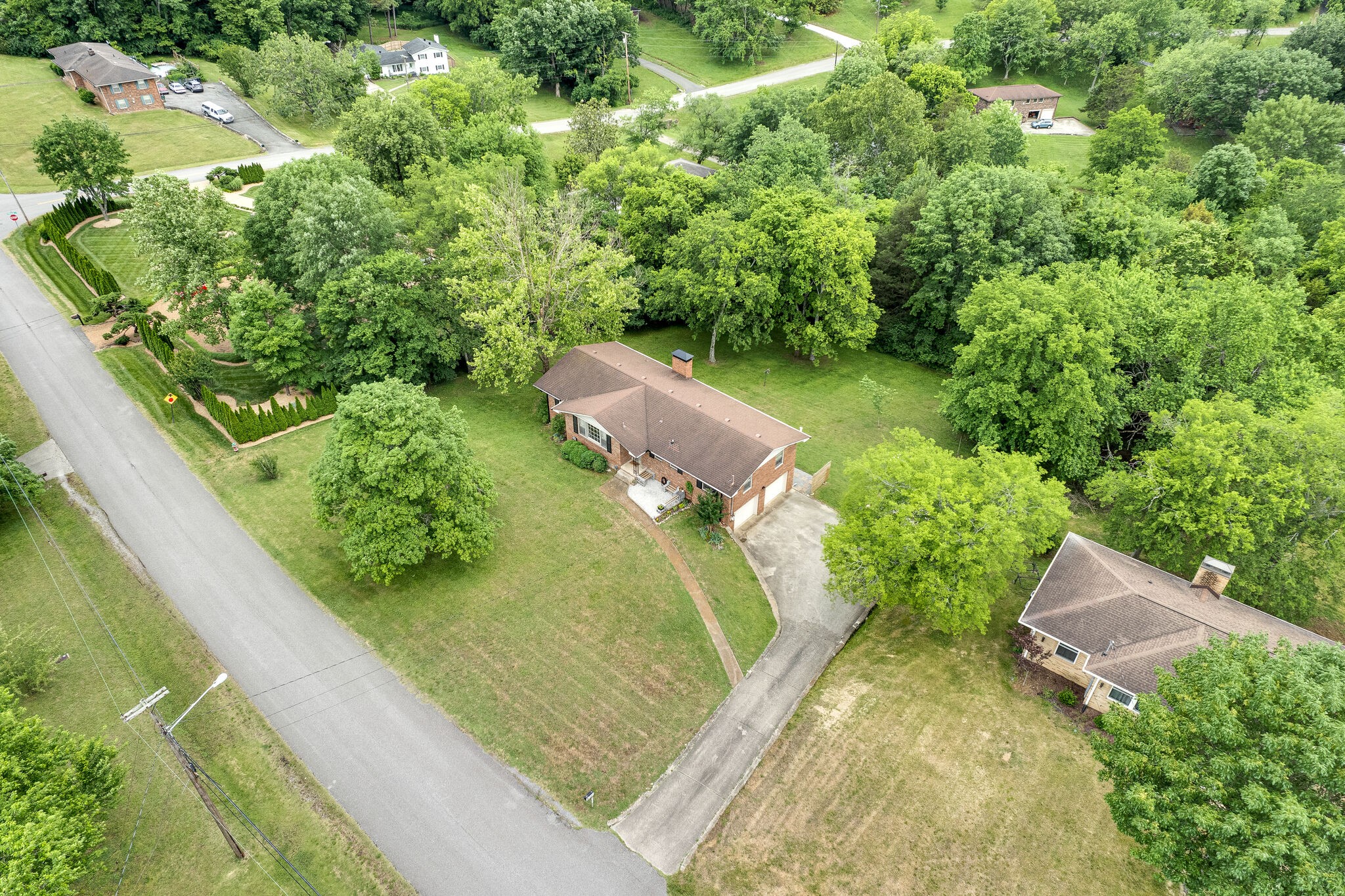 705 Vanoke Drive Madison, TN 37115 - Photo 35 of 44 a view of a garden with an outdoor seating