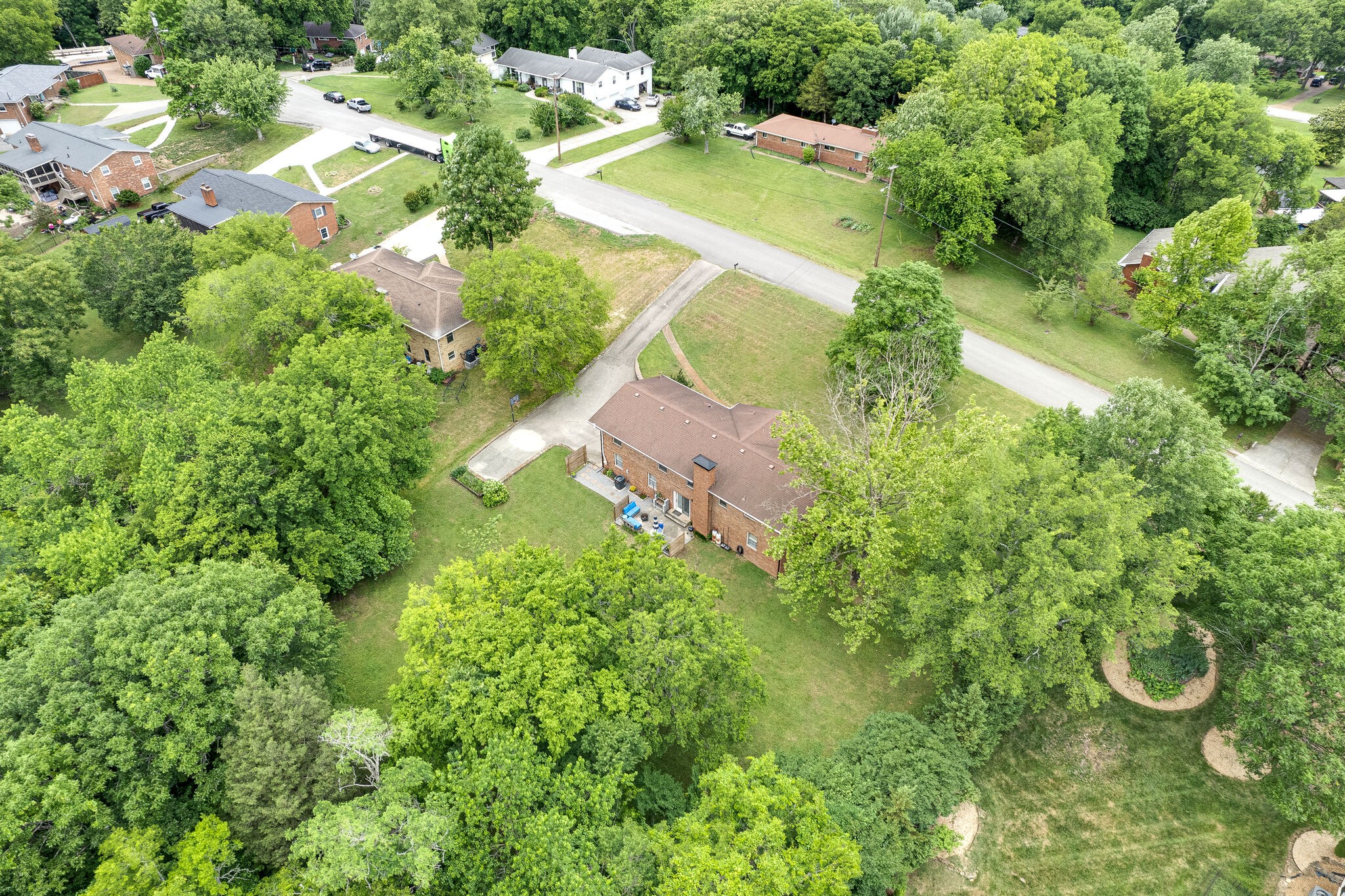 705 Vanoke Drive Madison, TN 37115 - Photo 38 of 44 an aerial view of residential house with outdoor space and trees all around