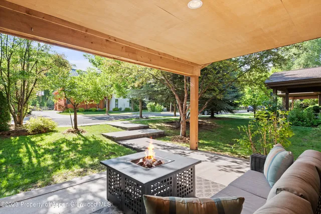 a outdoor living space with furniture and garden view