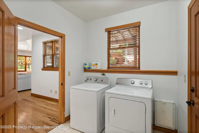 a utility room with dryer and washer