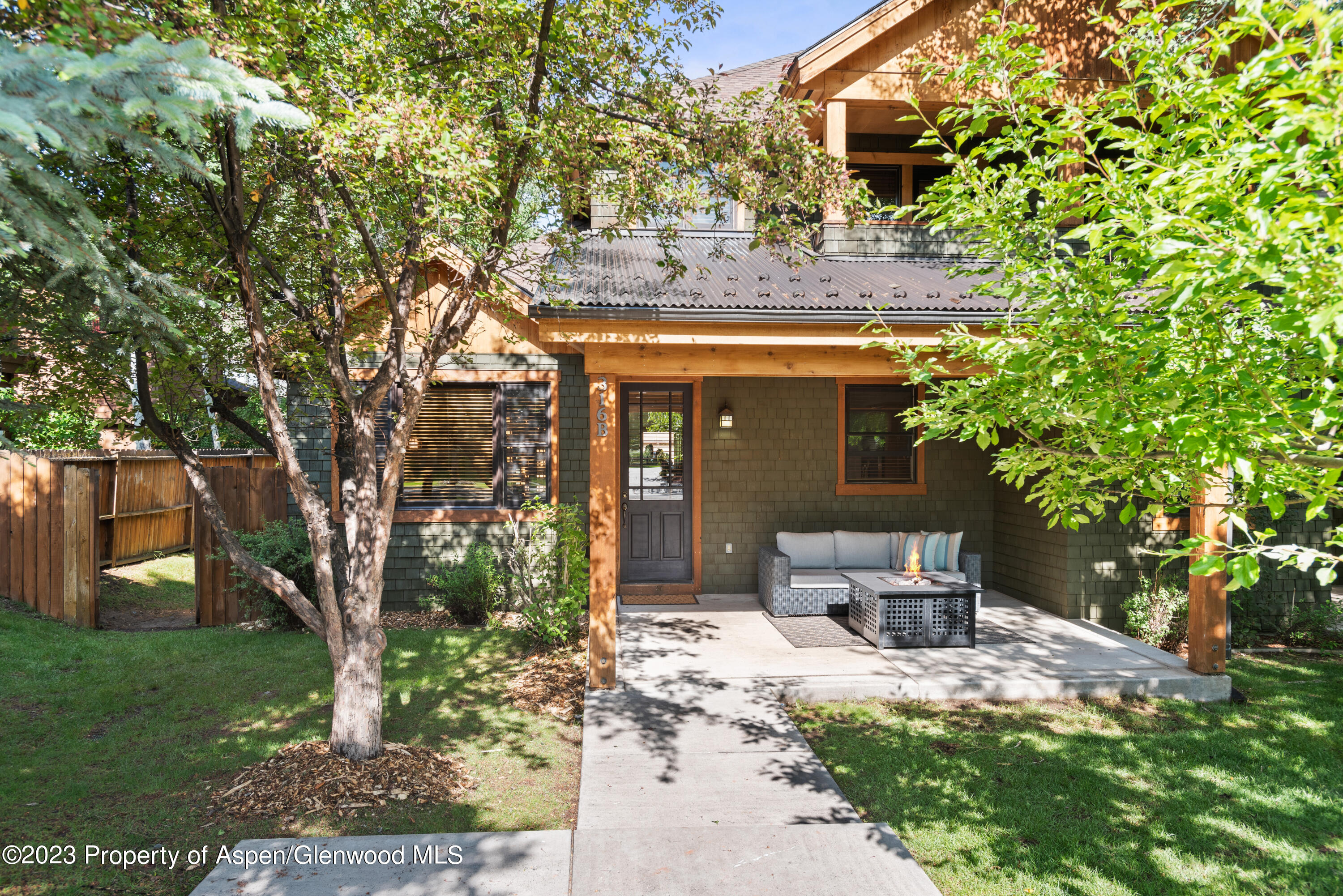 316 Allison Lane, Unit B Basalt, CO 81621 - Photo 26 of 26 a front view of a house with garden