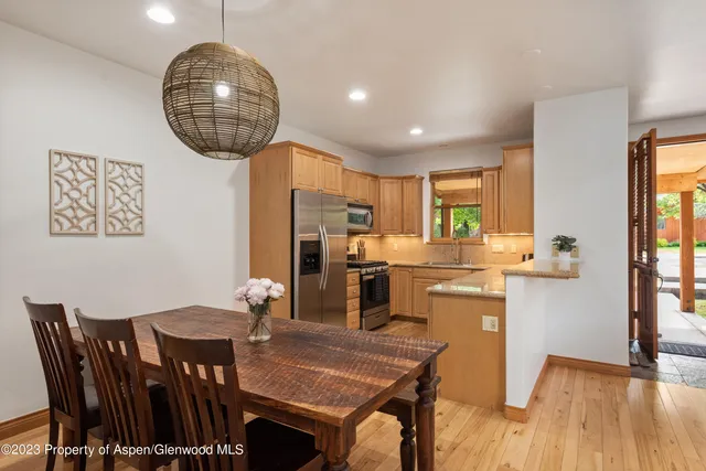 a view of a dining room with furniture