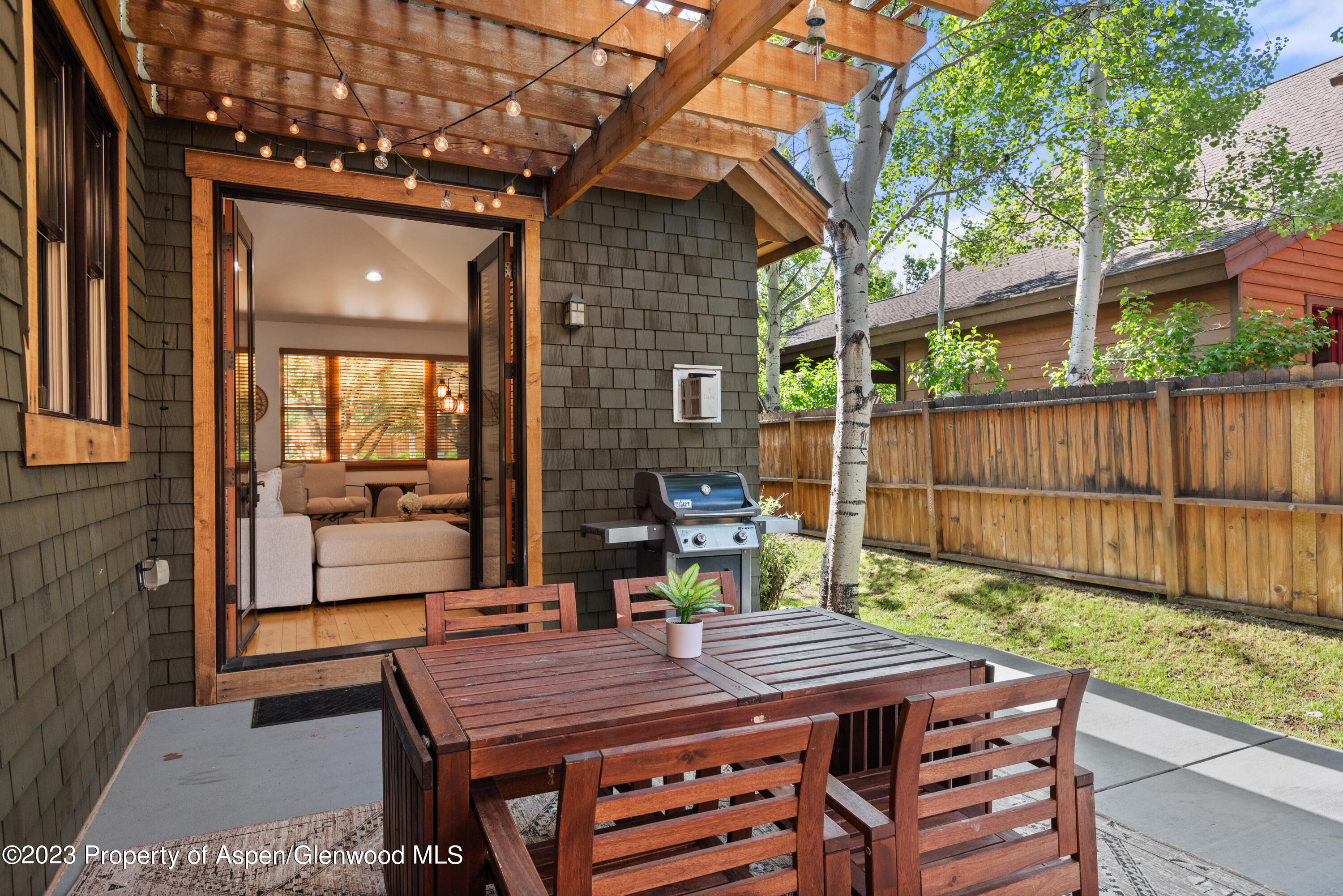 316 Allison Lane, Unit B Basalt, CO 81621 - Photo 10 of 26 a view of a patio with a table and chairs