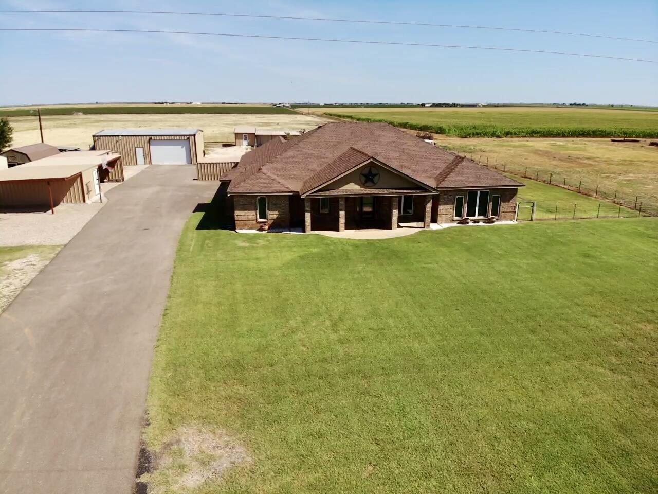 9223 County Road 6700 Lubbock, TX 79403 - Photo 25 of 60 a view of a house with a ocean view