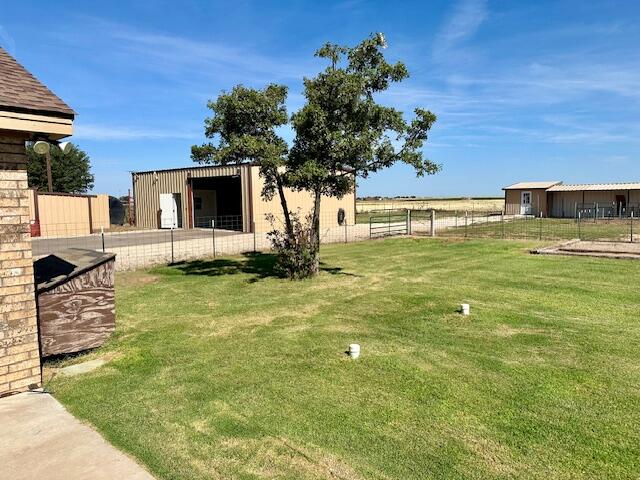 9223 County Road 6700 Lubbock, TX 79403 - Photo 44 of 60 a view of a swimming pool with a house