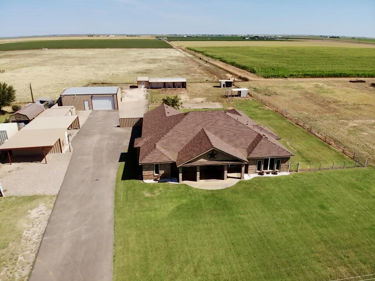 9223 County Road 6700 Lubbock, TX 79403 - Photo 50 of 60 an aerial view of a house with a ocean view
