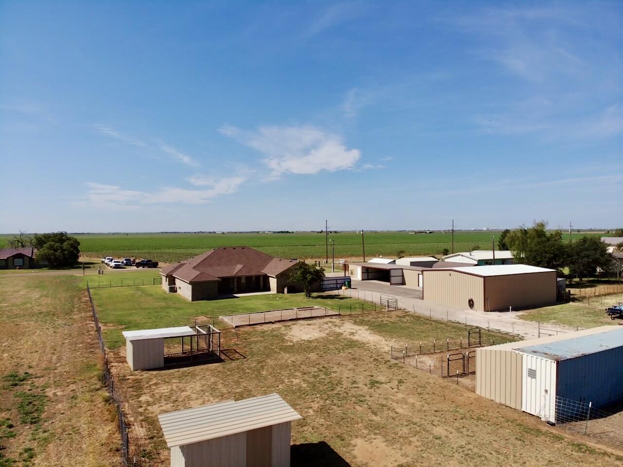 9223 County Road 6700 Lubbock, TX 79403 - Photo 54 of 60 an aerial view of a house with a garden