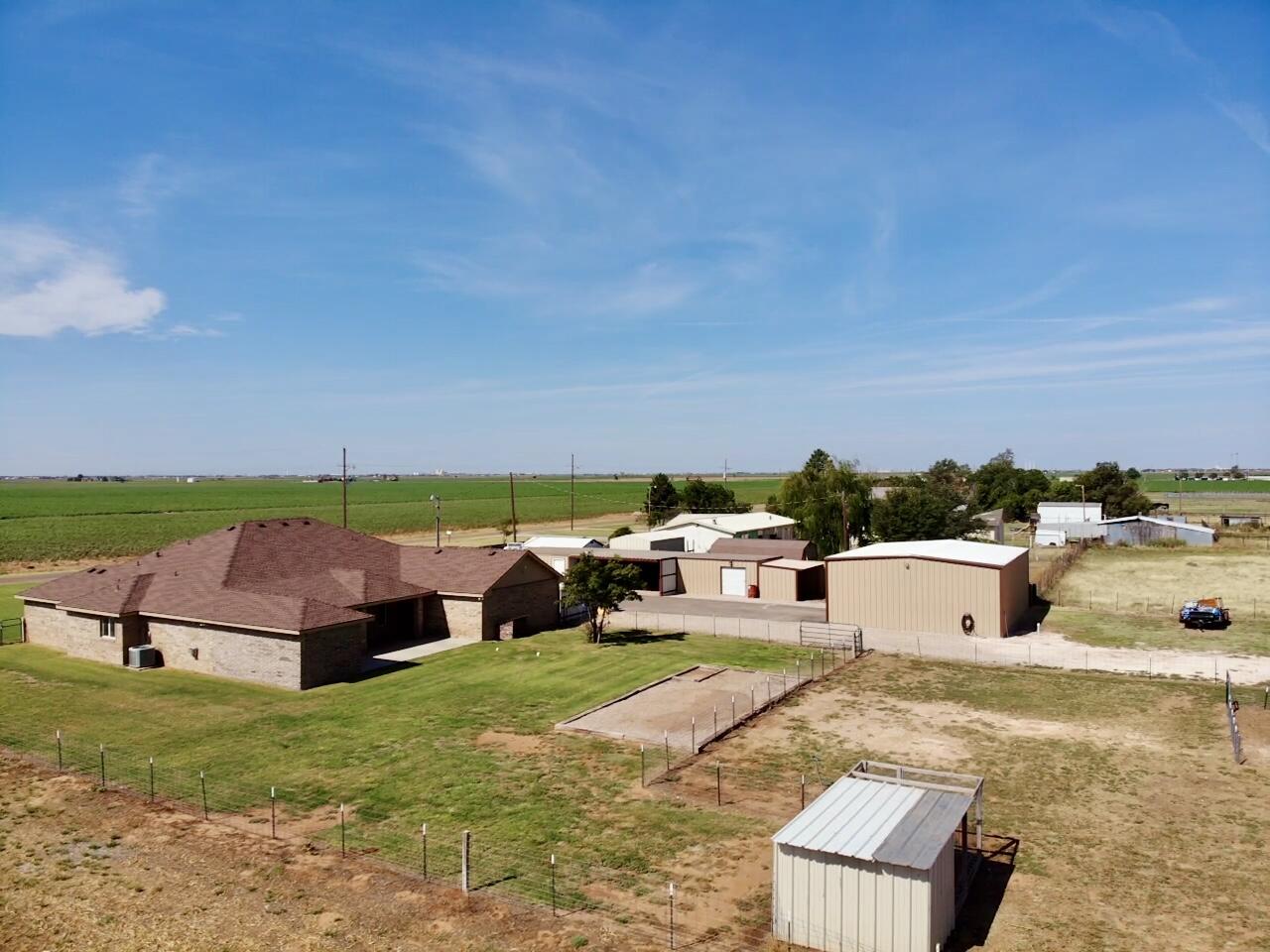 9223 County Road 6700 Lubbock, TX 79403 - Photo 55 of 60 an aerial view of a house with garden space