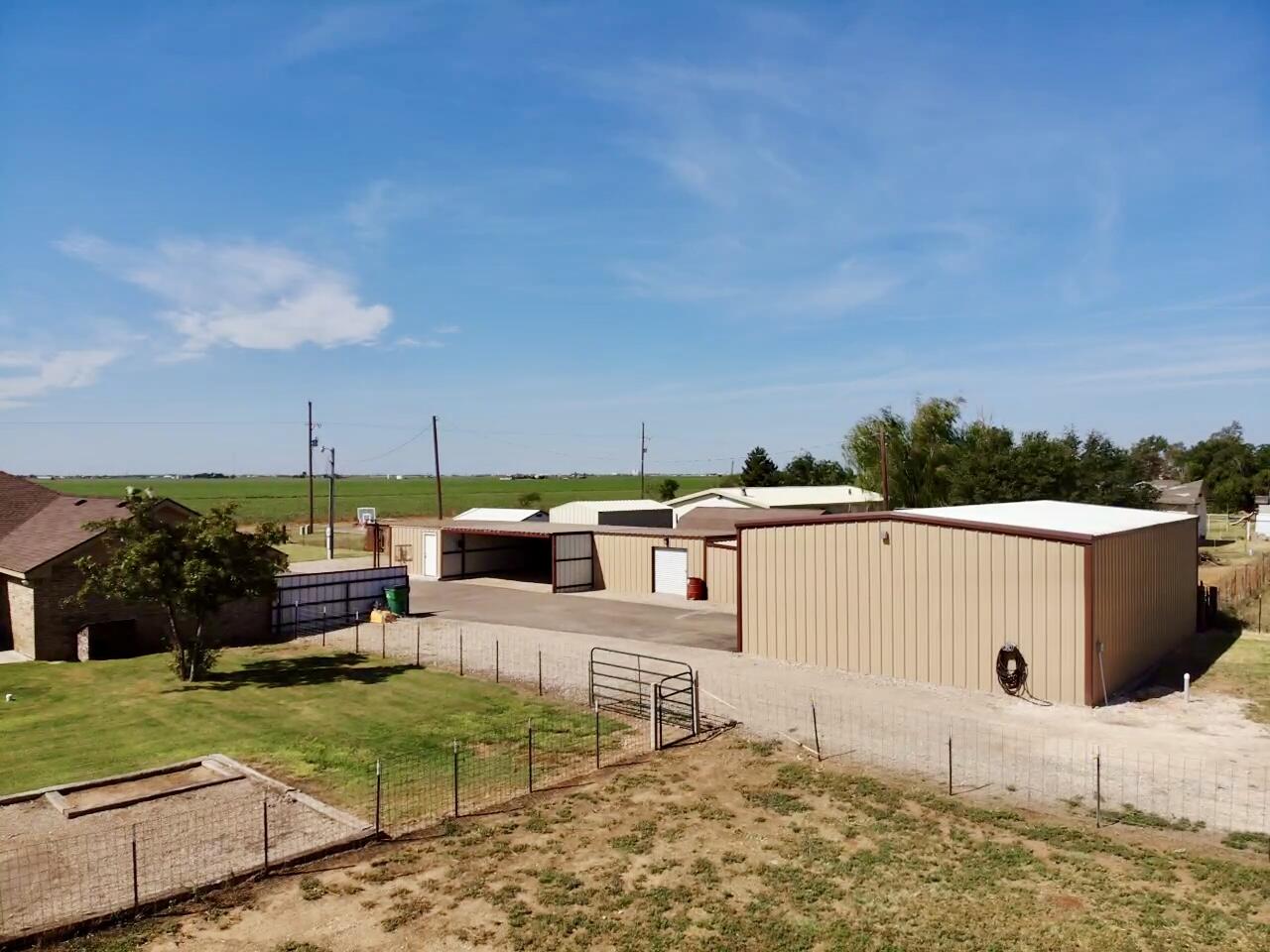 9223 County Road 6700 Lubbock, TX 79403 - Photo 57 of 60 a view of a terrace with chairs