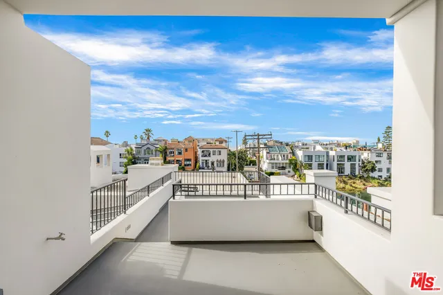 a view of a balcony with city view