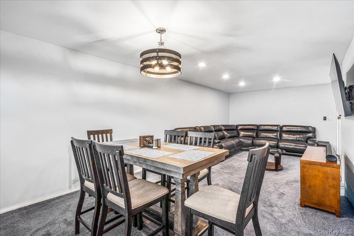 10 Lenox Road, Unit 2F Rockville Centre, NY 11570 - Photo 6 of 21 a view of a dining room and chairs