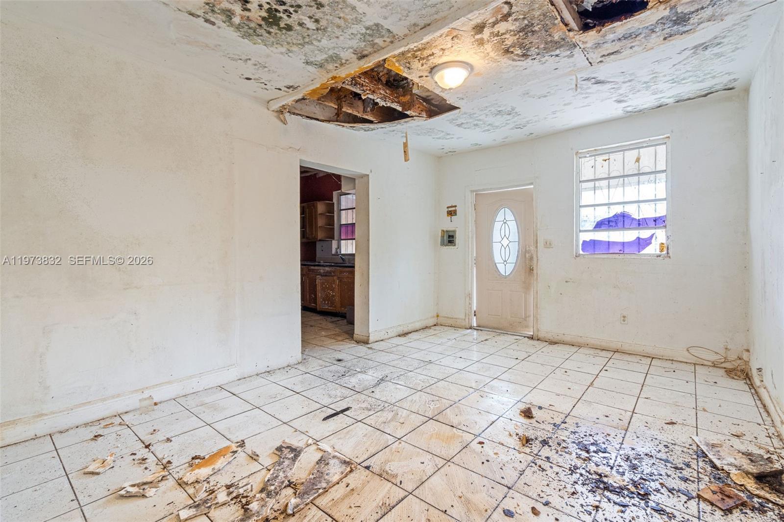 1045 Southwest 20th Avenue Miami, FL 33135 - Photo 29 of 53 an empty room with windows