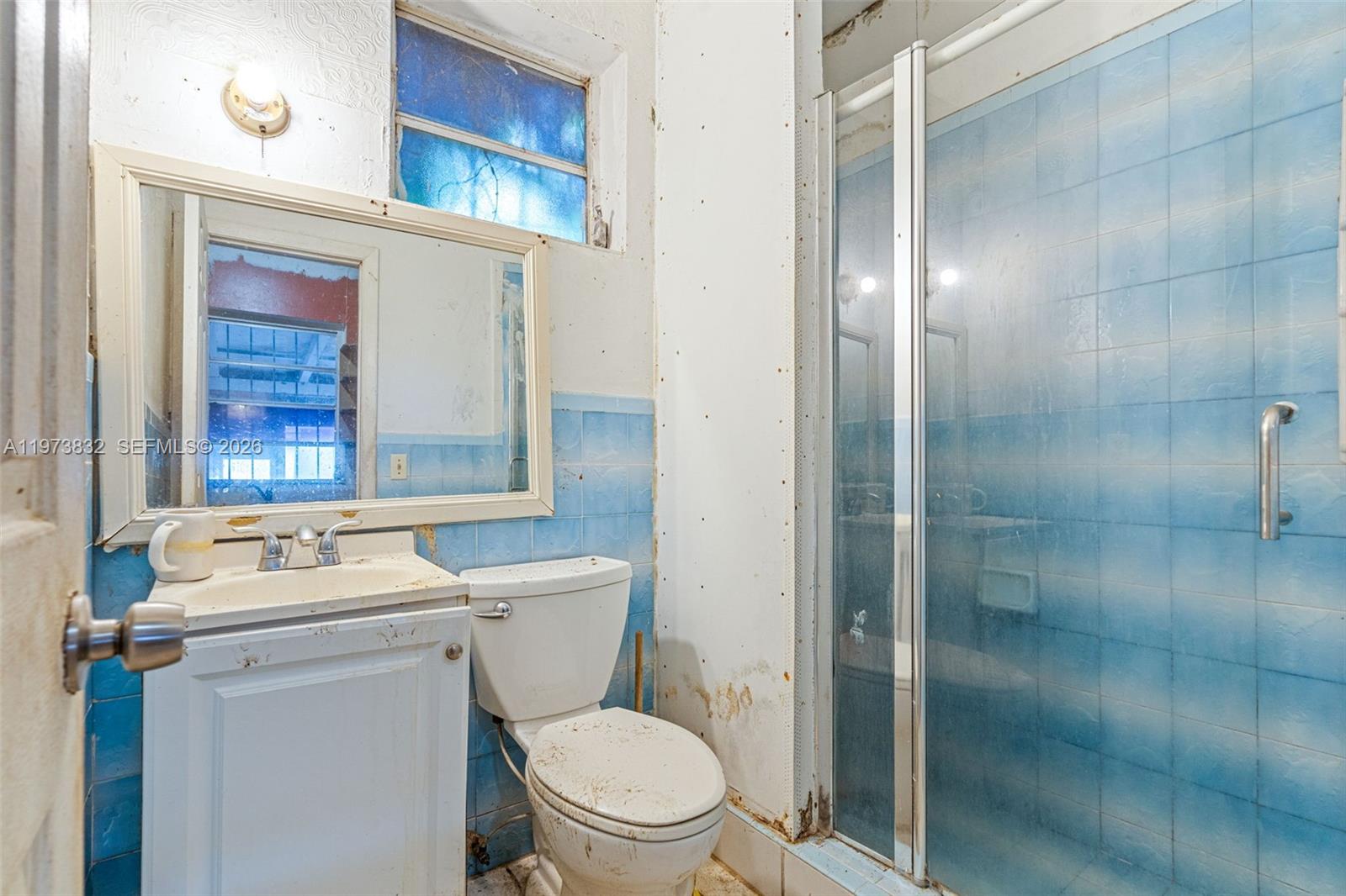 1045 Southwest 20th Avenue Miami, FL 33135 - Photo 33 of 53 a bathroom with a sink toilet and shower